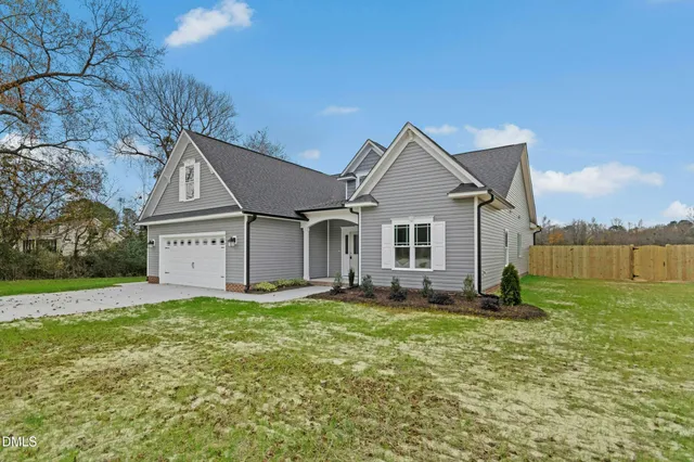 a big house with a big yard and more windows