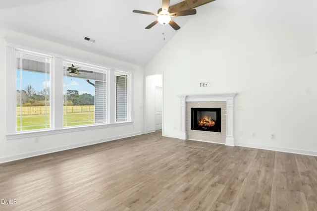 a view of an entryway with wooden floor