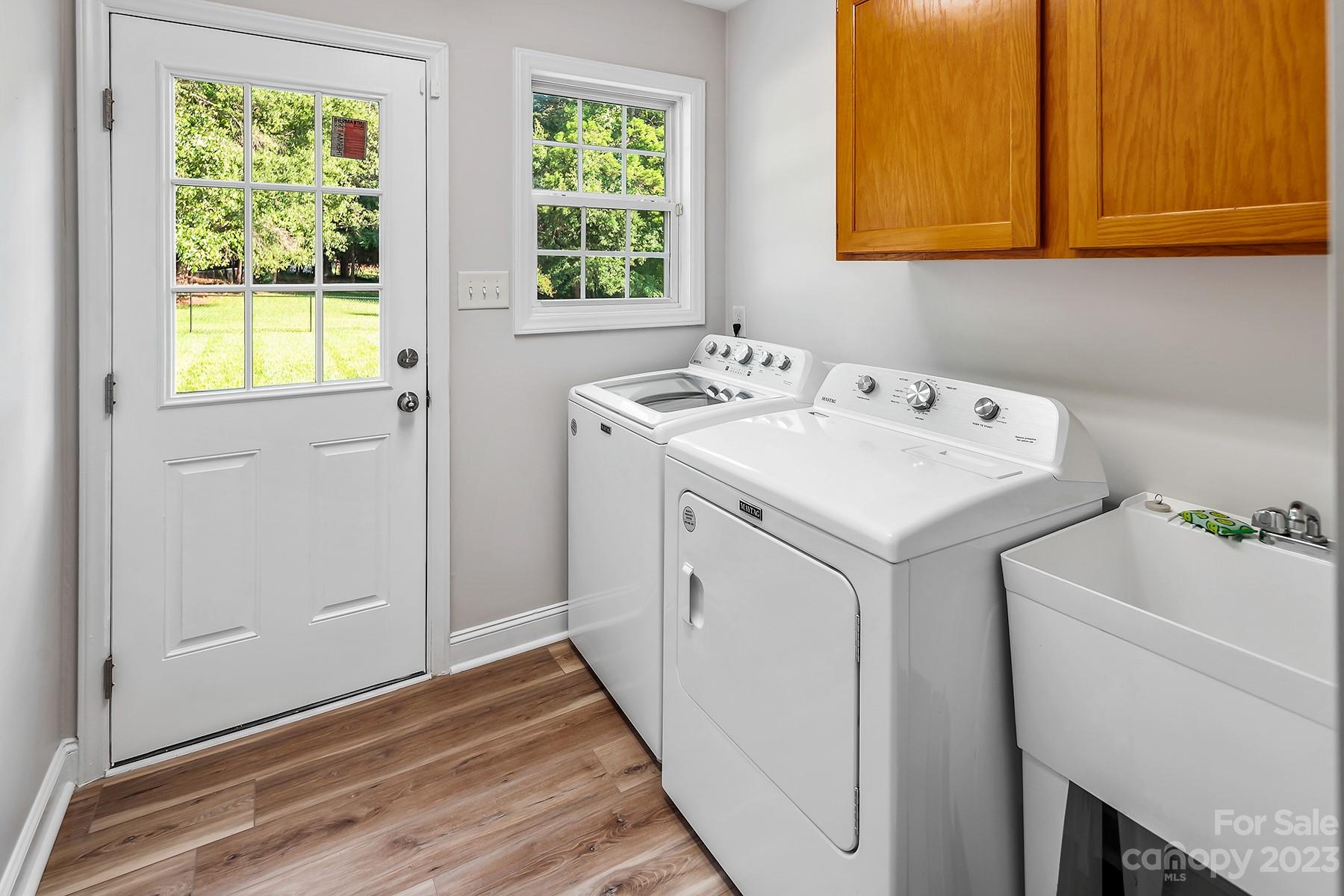 211 Todd Circle Wingate, NC 28174 - Photo 16 of 45 a utility room with dryer and washer