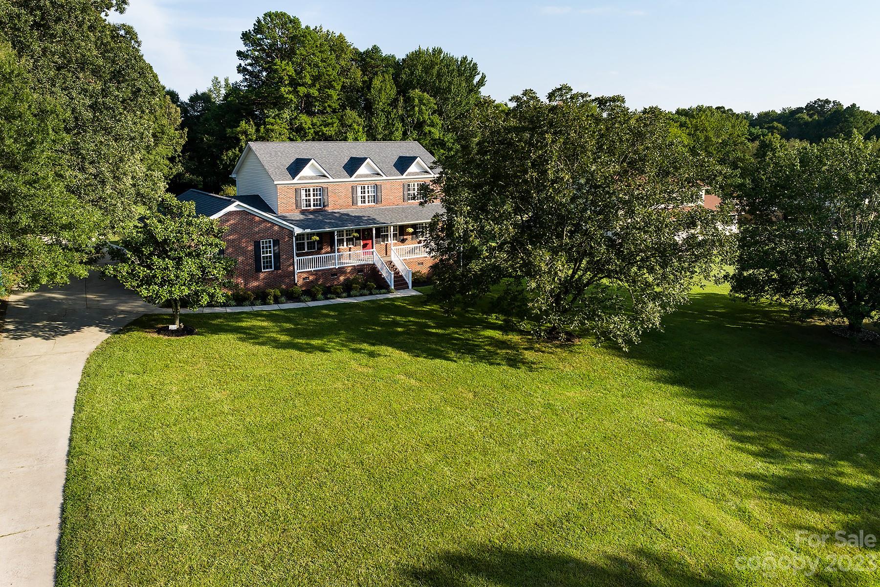 211 Todd Circle Wingate, NC 28174 - Photo 2 of 45 an aerial view of a house with a garden