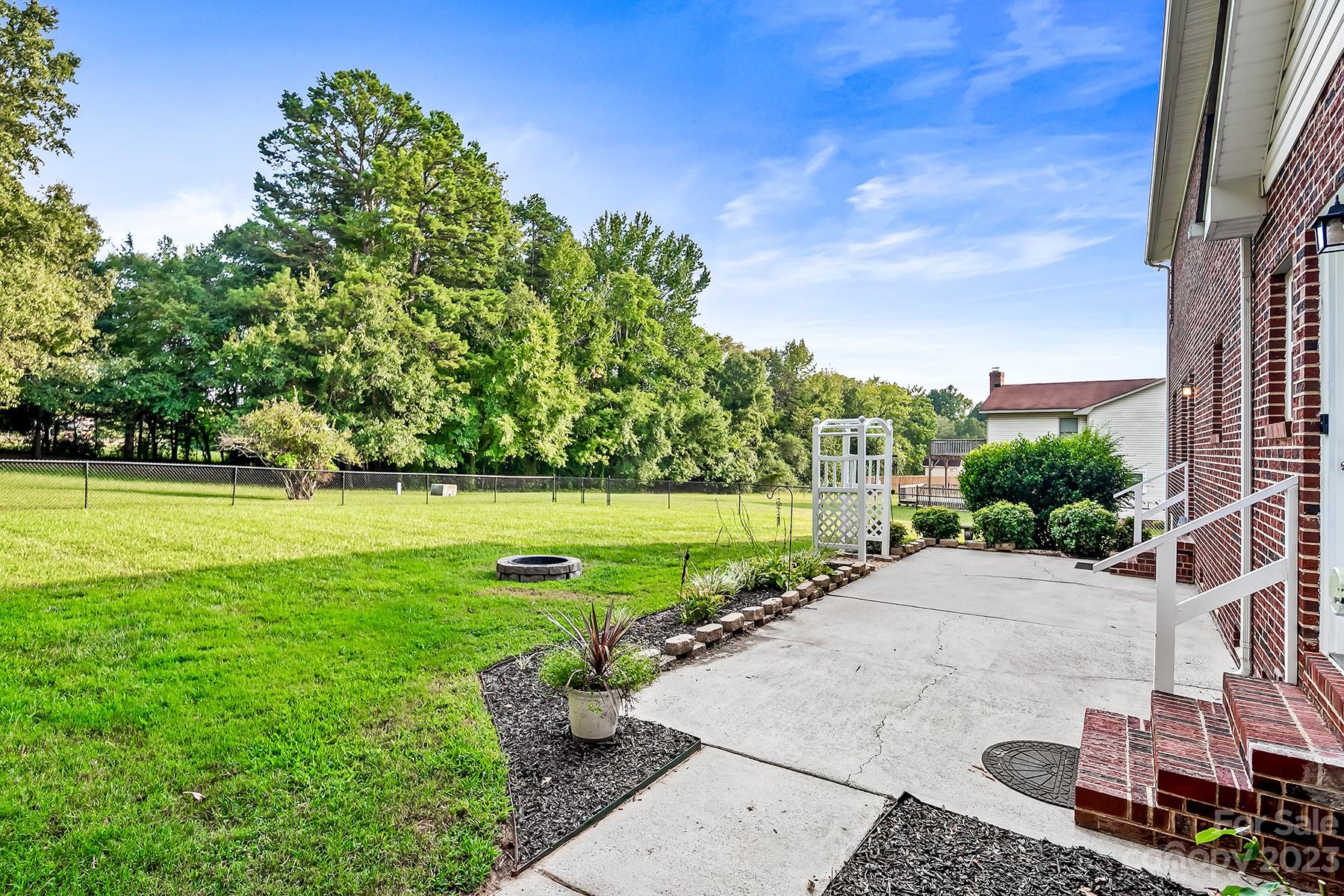 211 Todd Circle Wingate, NC 28174 - Photo 37 of 45 a view of a garden with an outdoor space