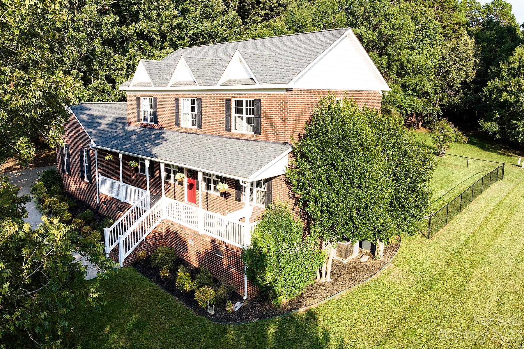 211 Todd Circle Wingate, NC 28174 - Photo 45 of 45 front view of house with a yard