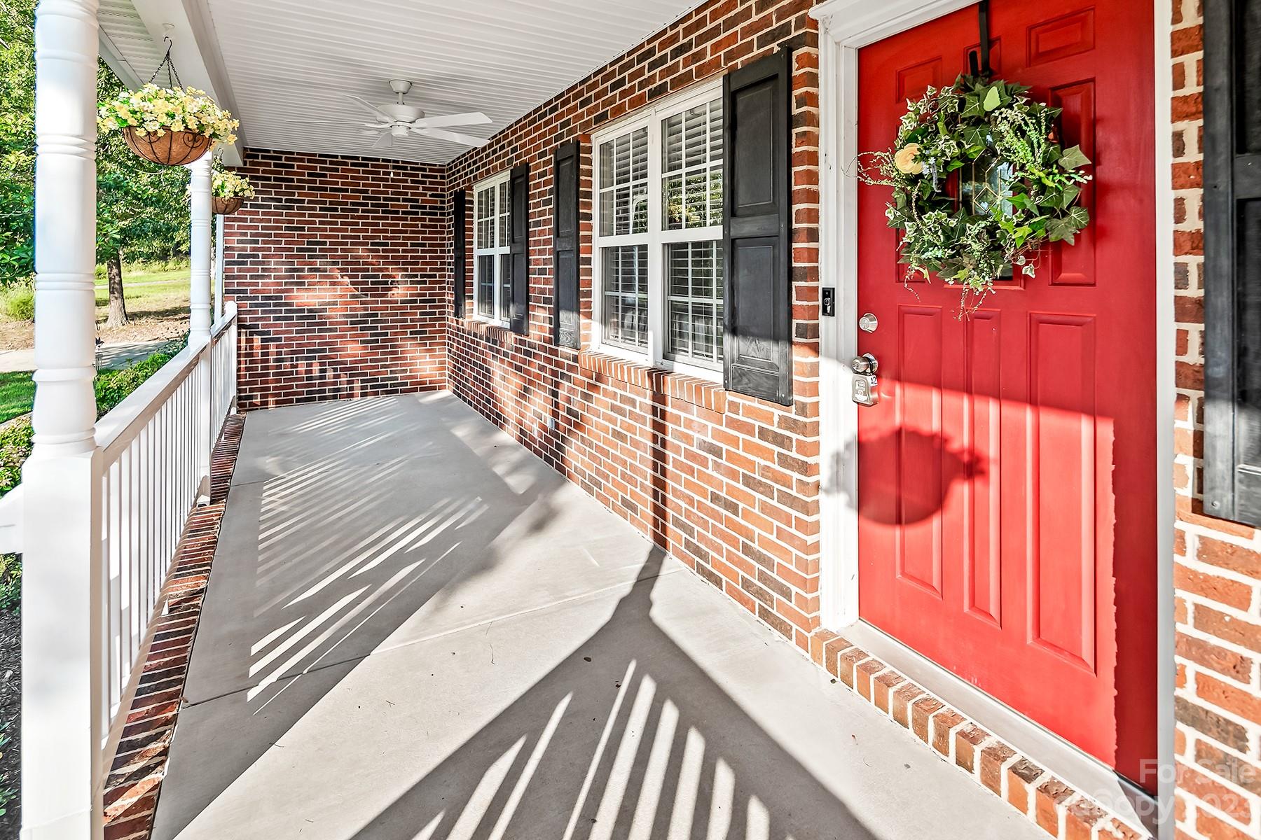 211 Todd Circle Wingate, NC 28174 - Photo 6 of 45 a view of a balcony with a potted plant