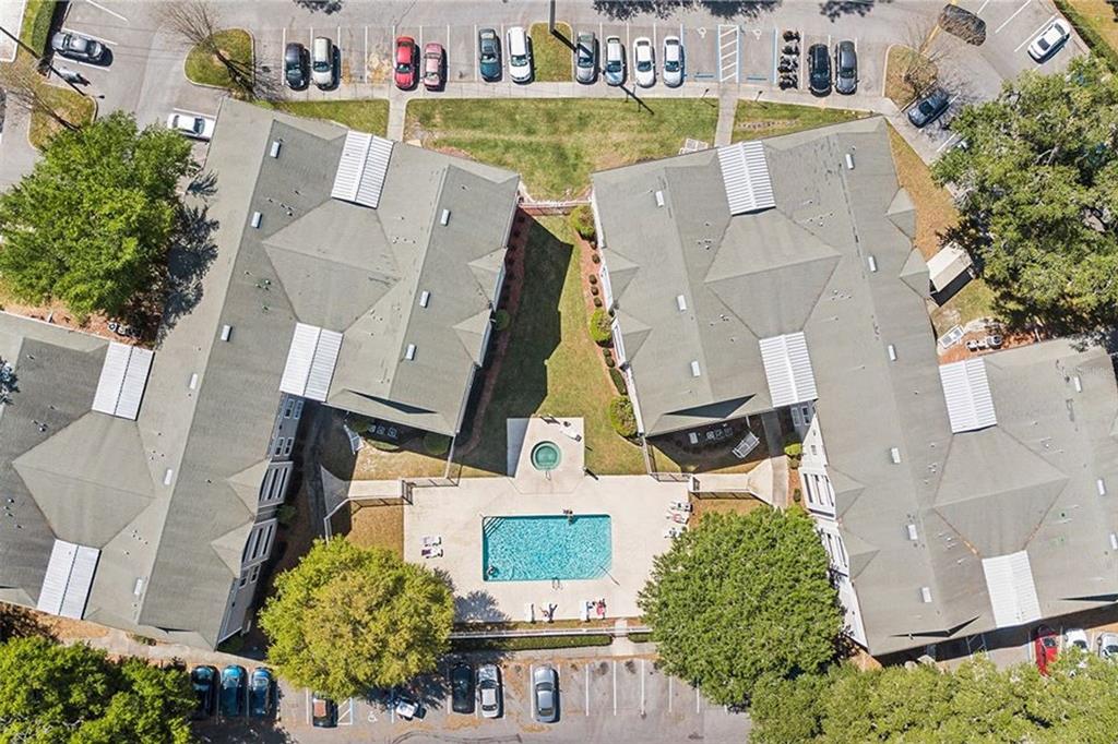 4000 Southwest 23rd Street, Unit 5106 Gainesville, FL 32608 - Photo 2 of 9 an aerial view of a house with a swimming pool