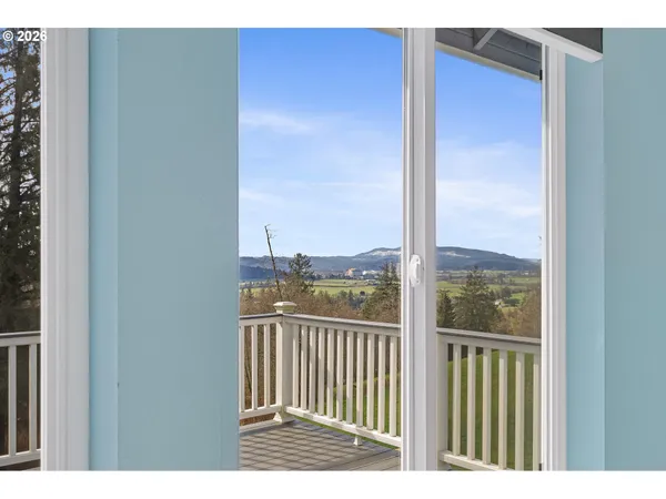 a view of a balcony from a door