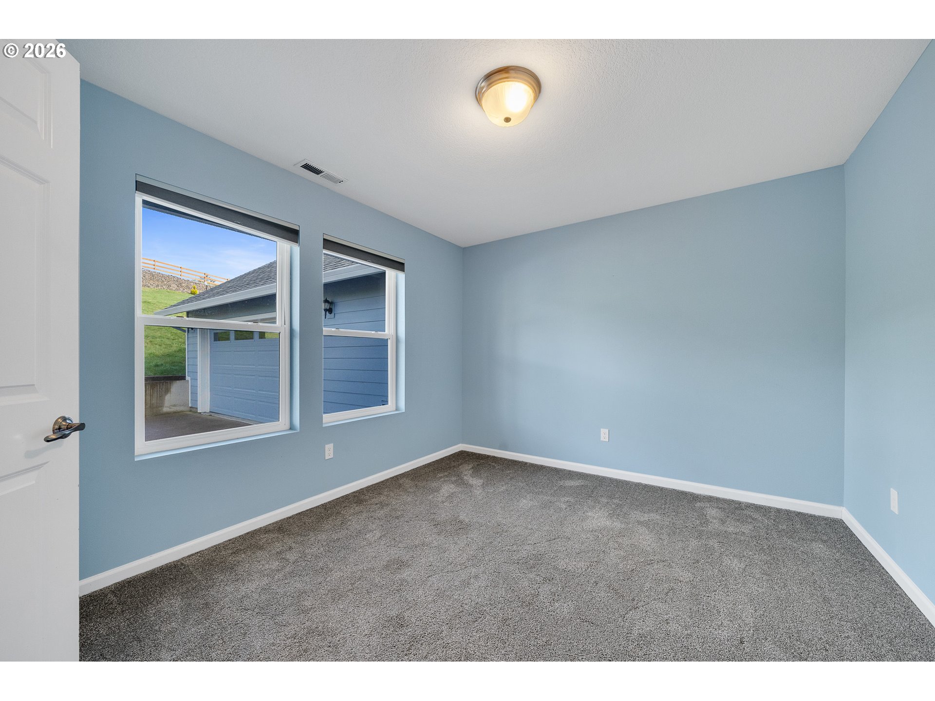 10360 Skyview Road Tillamook, OR 97141 - Photo 17 of 42 an empty room with windows