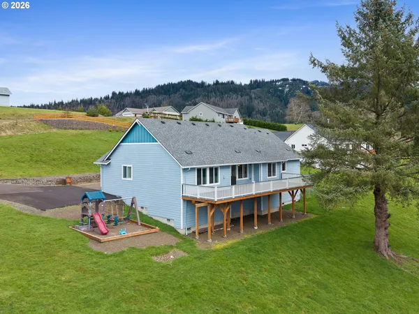 a view of a house with a garden