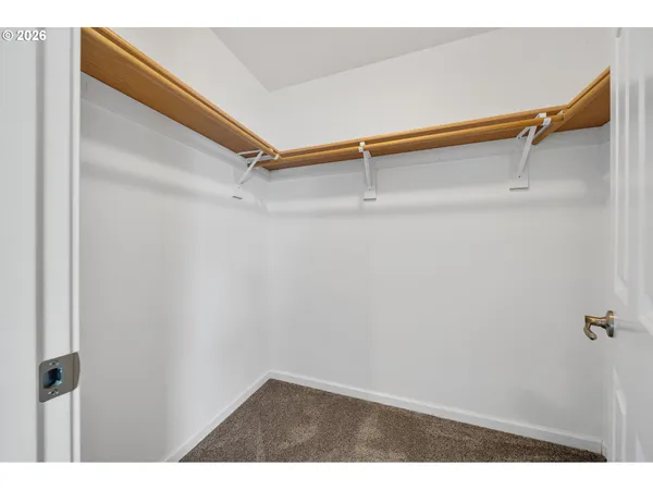 a view of small space with racks on the wall