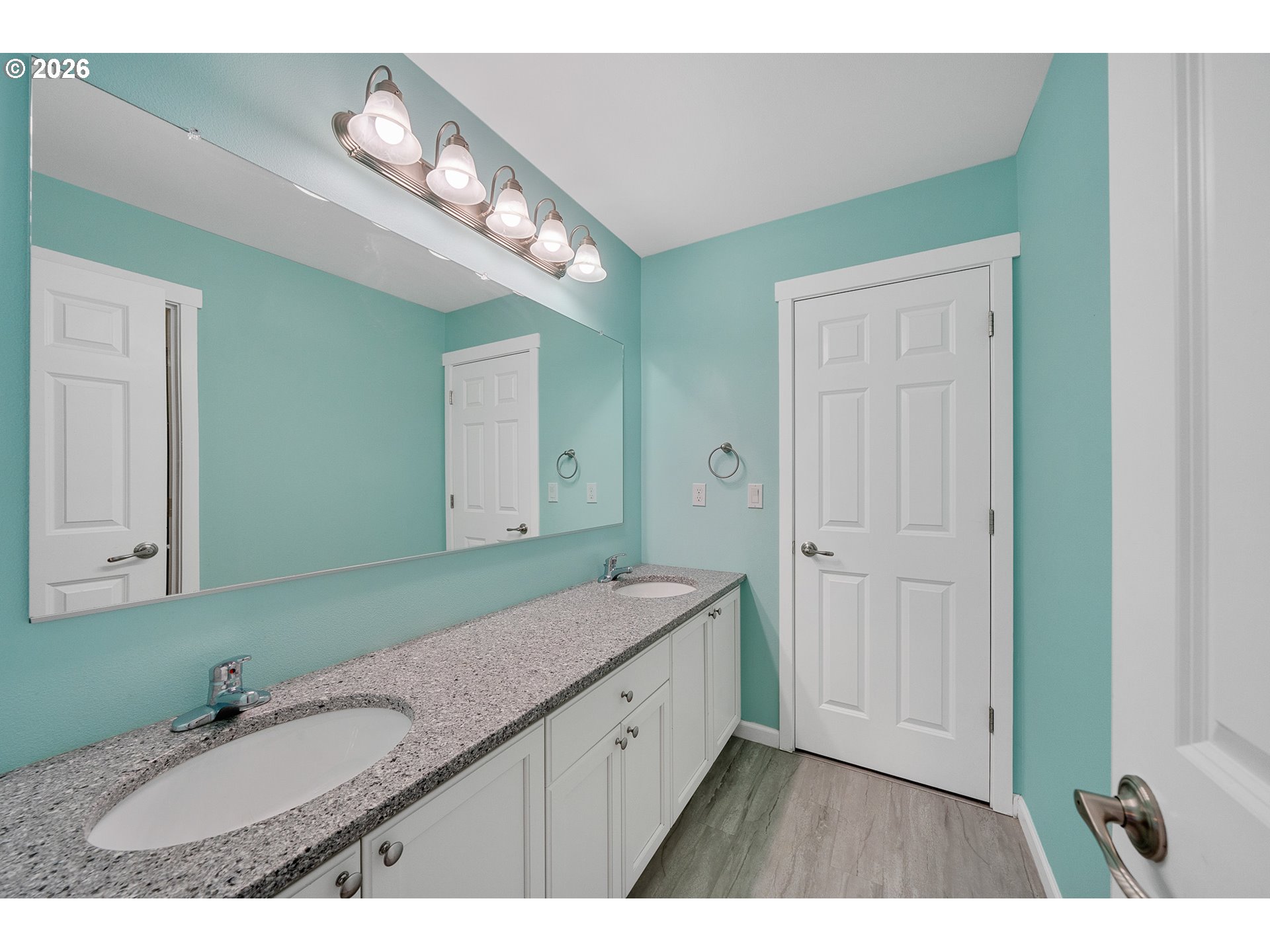 10360 Skyview Road Tillamook, OR 97141 - Photo 27 of 42 a bathroom with a granite countertop sink mirror and a