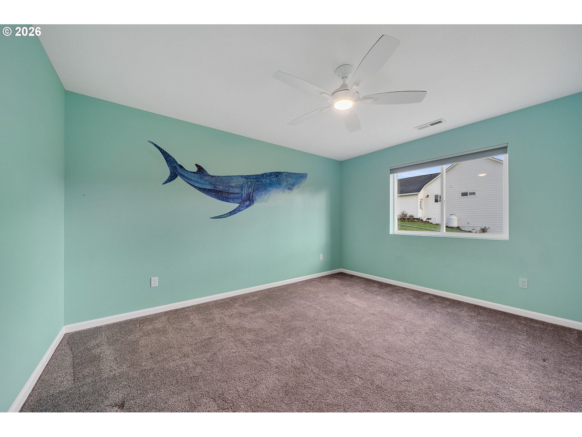 10360 Skyview Road Tillamook, OR 97141 - Photo 30 of 42 a view of a room with a fan & a window