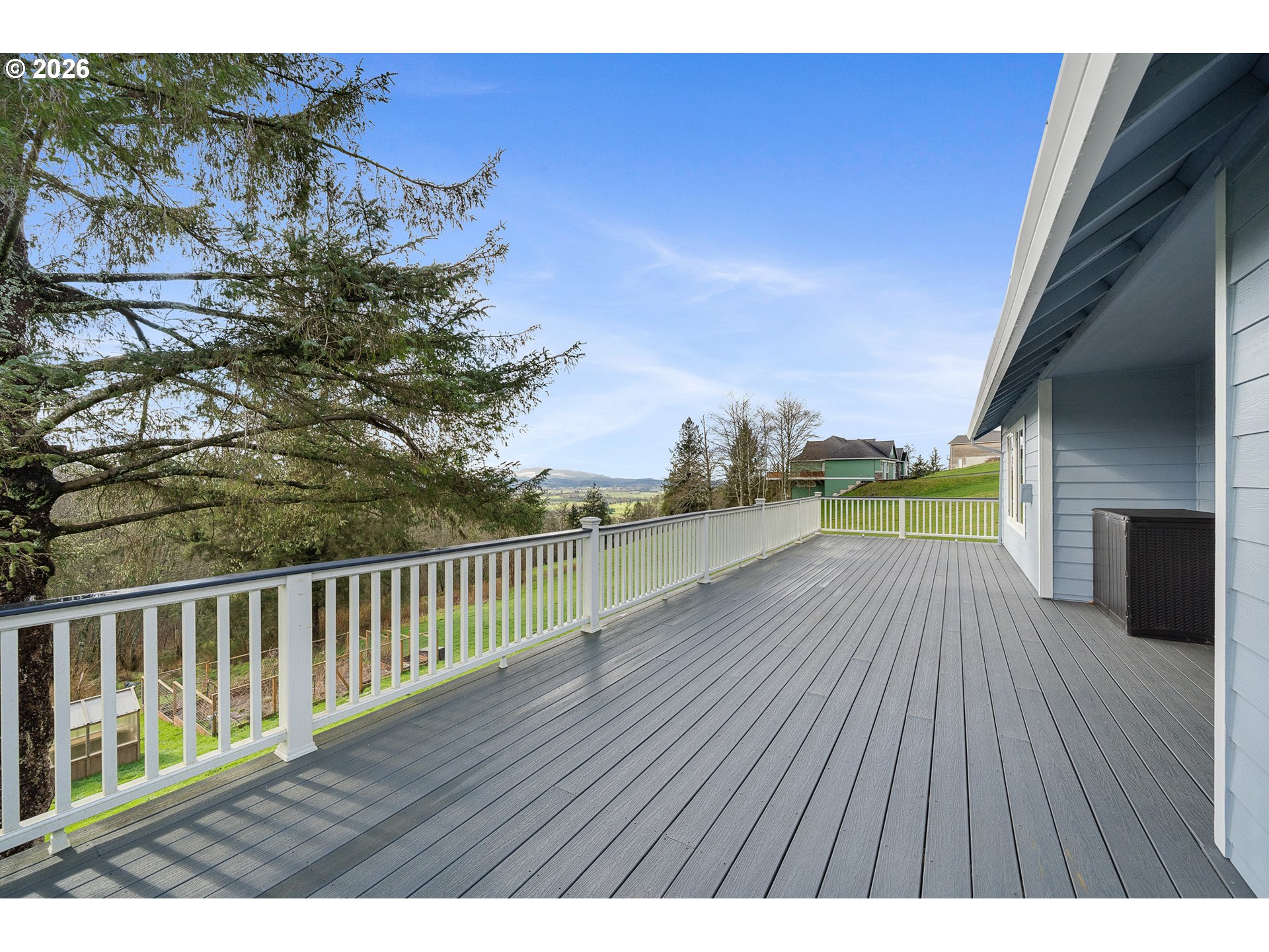 10360 Skyview Road Tillamook, OR 97141 - Photo 34 of 42 a view of balcony with wooden floor and fence