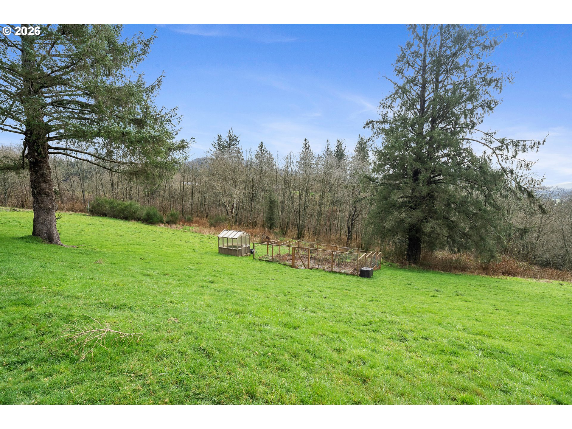 10360 Skyview Road Tillamook, OR 97141 - Photo 39 of 42 a view of a field with trees in the background