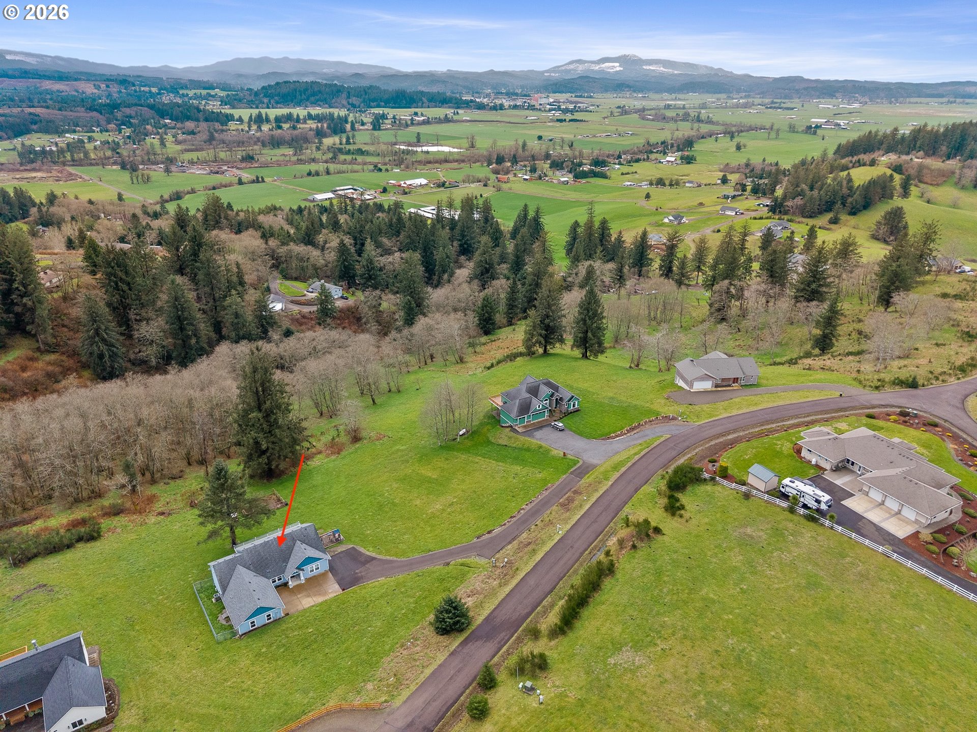10360 Skyview Road Tillamook, OR 97141 - Photo 4 of 42 an aerial view of a house with a garden