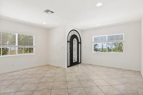 an empty room with windows