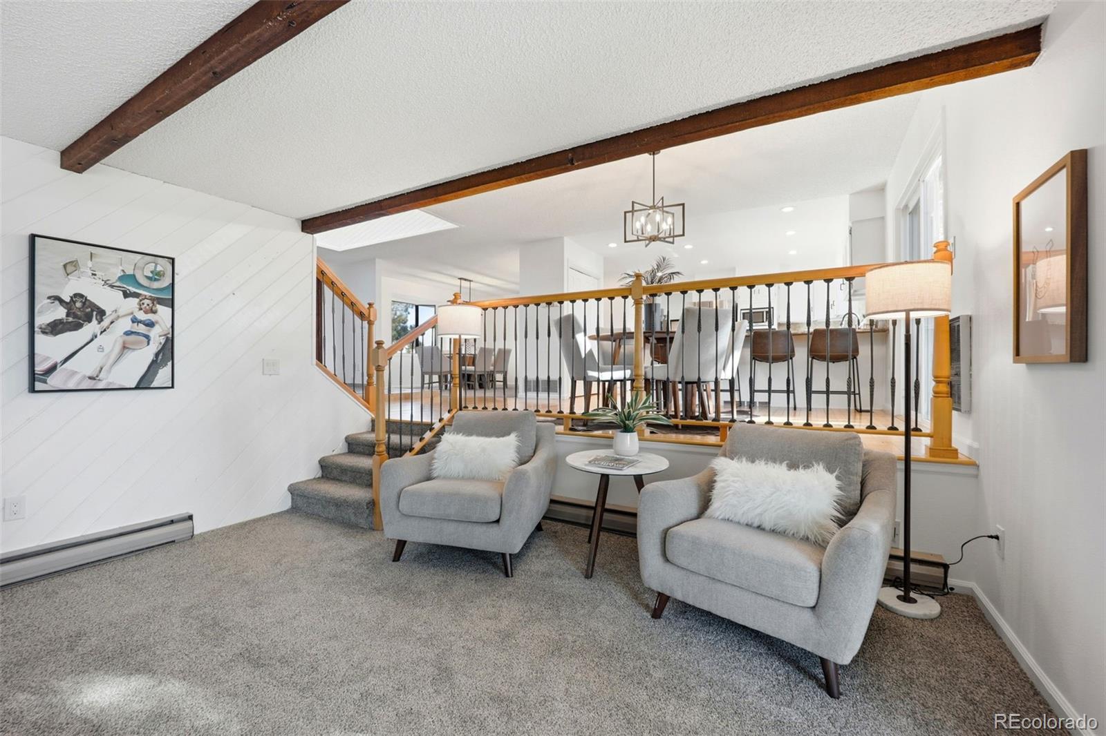 9212 East Tanglewood Road Franktown, CO 80116 - Photo 22 of 50 a living room with furniture and a large window