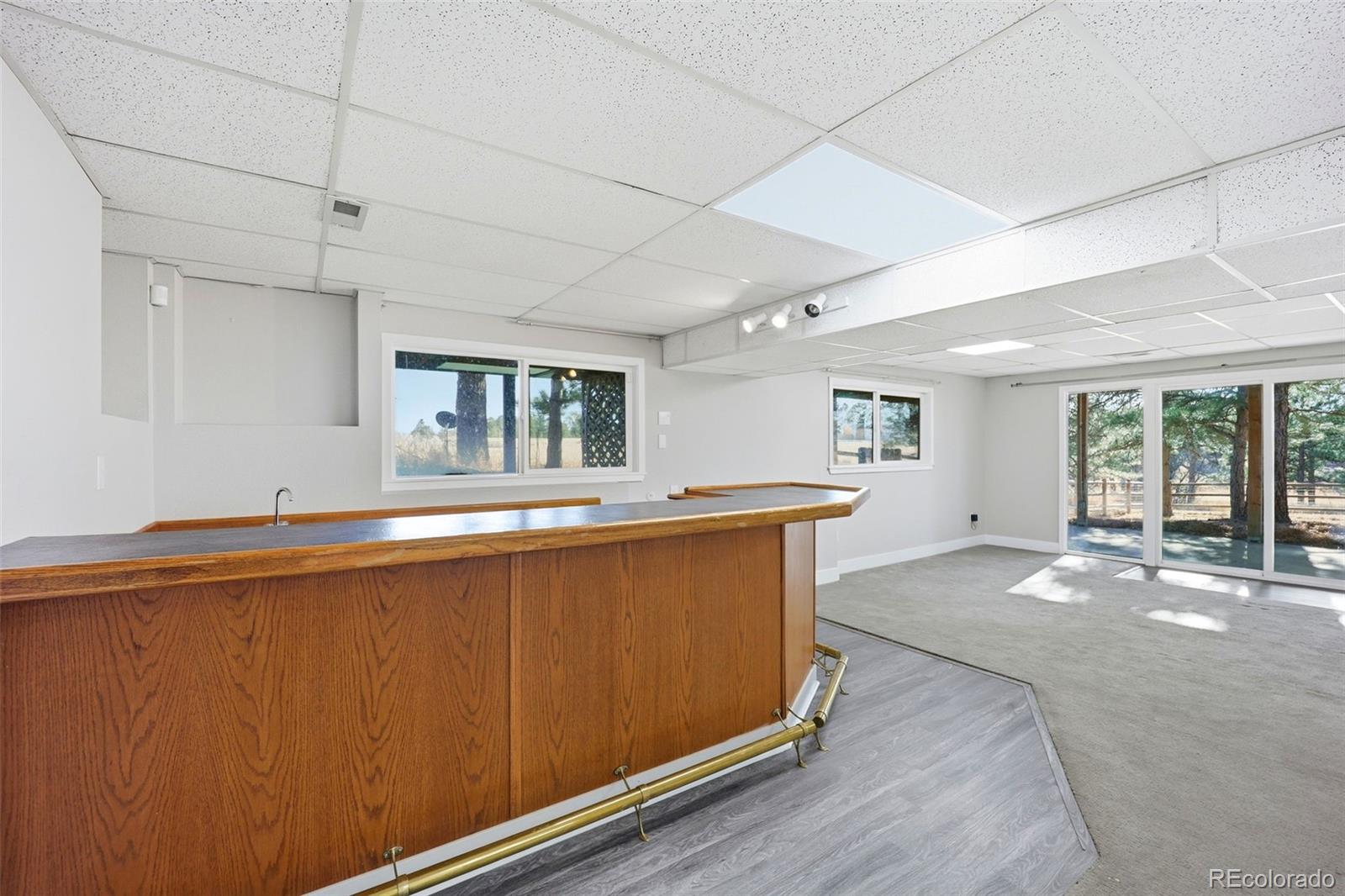 9212 East Tanglewood Road Franktown, CO 80116 - Photo 44 of 50 a view of a kitchen with a sink and window