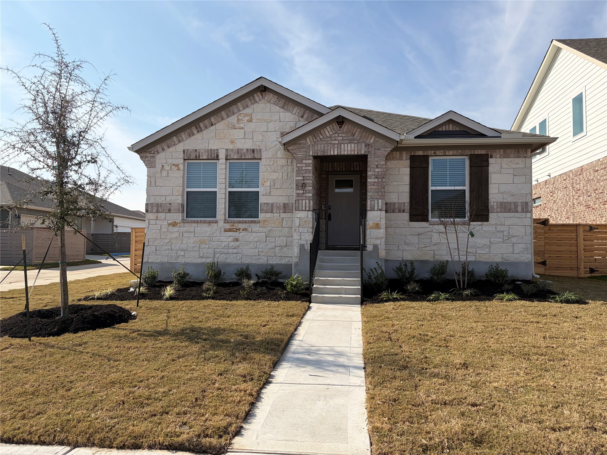 View of front of home with stone siding