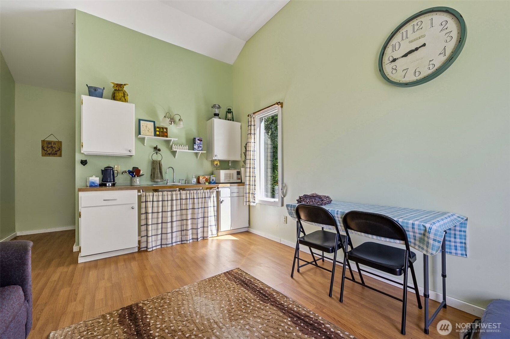 0 Boyd Road Randle, WA 98377 - Photo 26 of 39 a view of a dining room with furniture and wooden floor