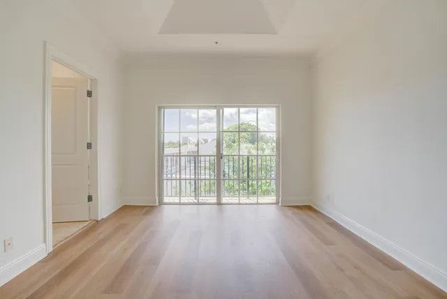 a white bath tub sitting next to a window