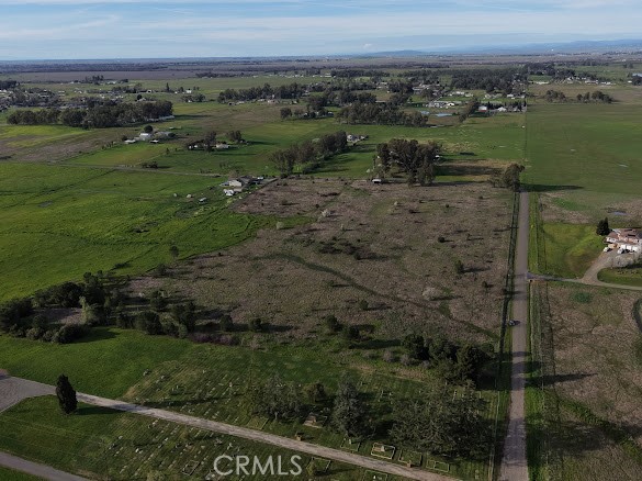 a view of a lake with a yard
