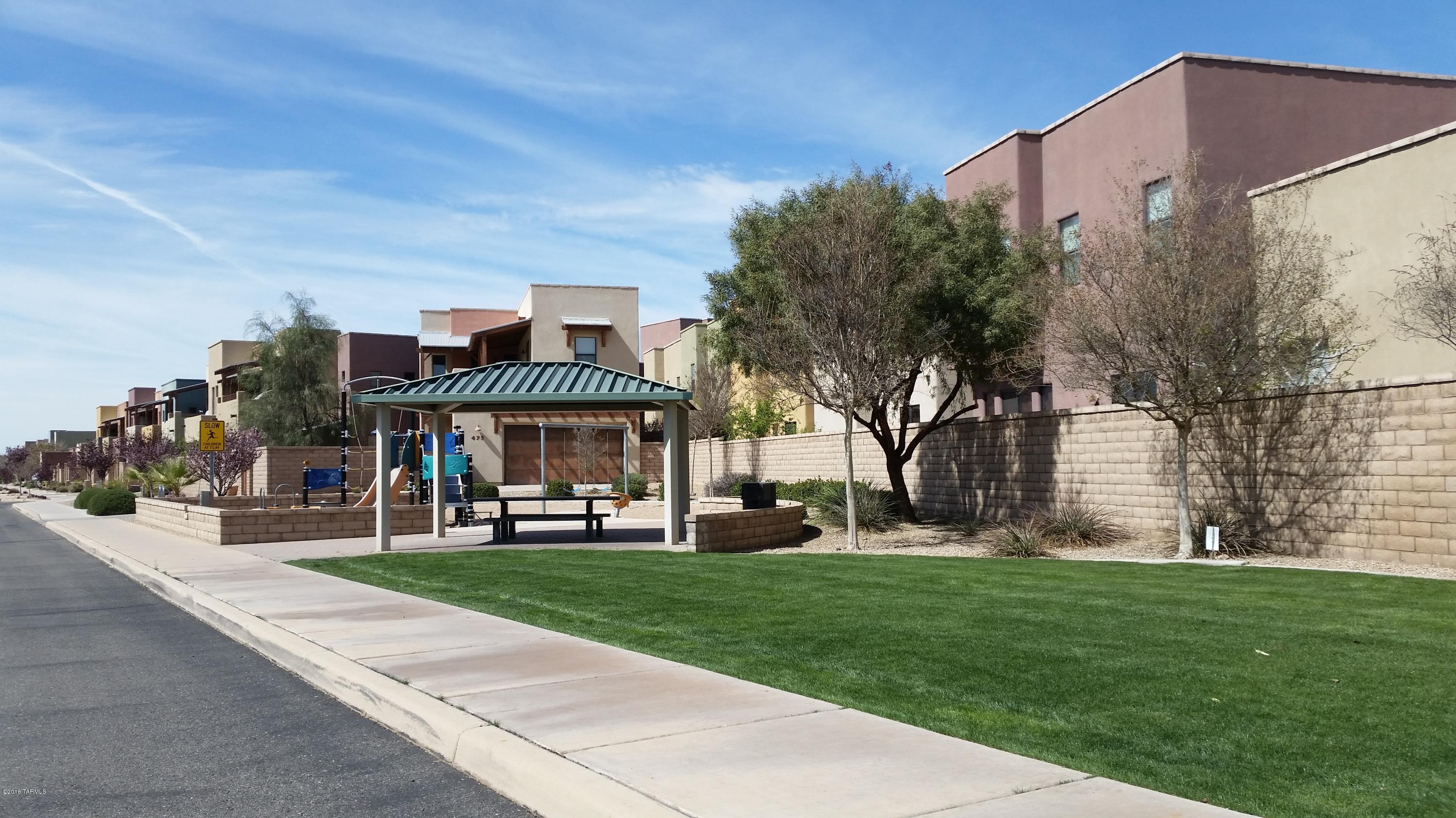 478 East Cedarvale Road Tucson, AZ 85704 - Photo 2 of 39 a front view of a building with garden