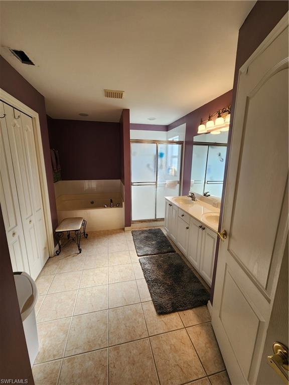 21524 Windham Run Estero, FL 33928 - Photo 12 of 18 a bedroom with a bed and a window