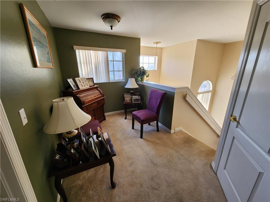 21524 Windham Run Estero, FL 33928 - Photo 15 of 18 a living room with furniture and a window