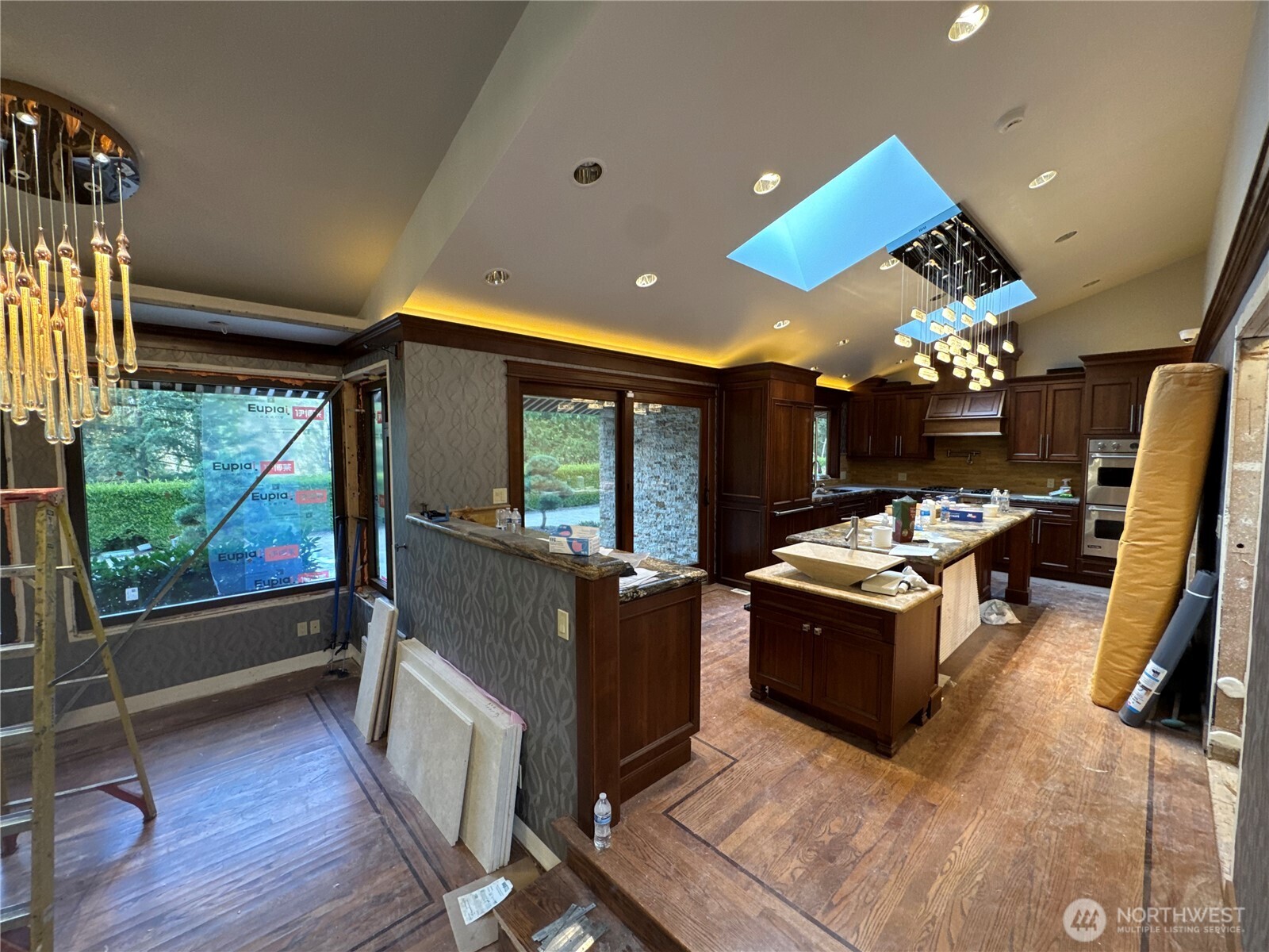 2620 Maltby Road Bothell, WA 98012 - Photo 29 of 39 a view of kitchen with furniture and a flat screen tv
