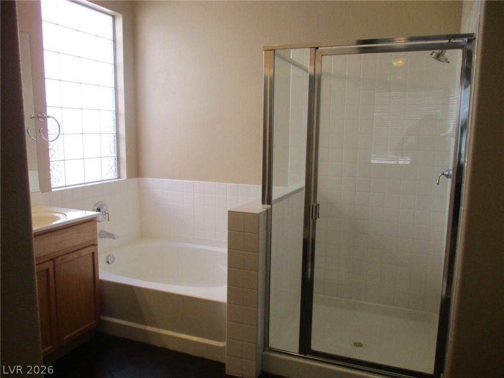 2435 Carnegie Hall Street Las Vegas, NV 89135 - Photo 13 of 25 Owner bath with separate tub and shower.
