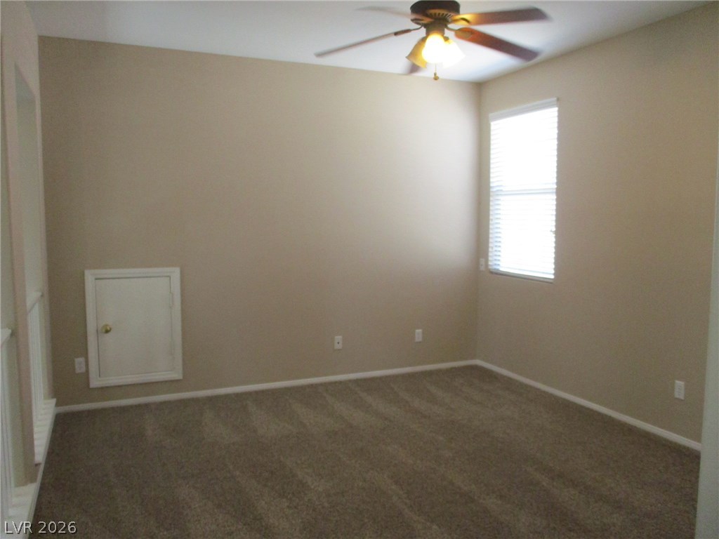 2435 Carnegie Hall Street Las Vegas, NV 89135 - Photo 20 of 25 Loft with ceiling fan and overlooking the living room.