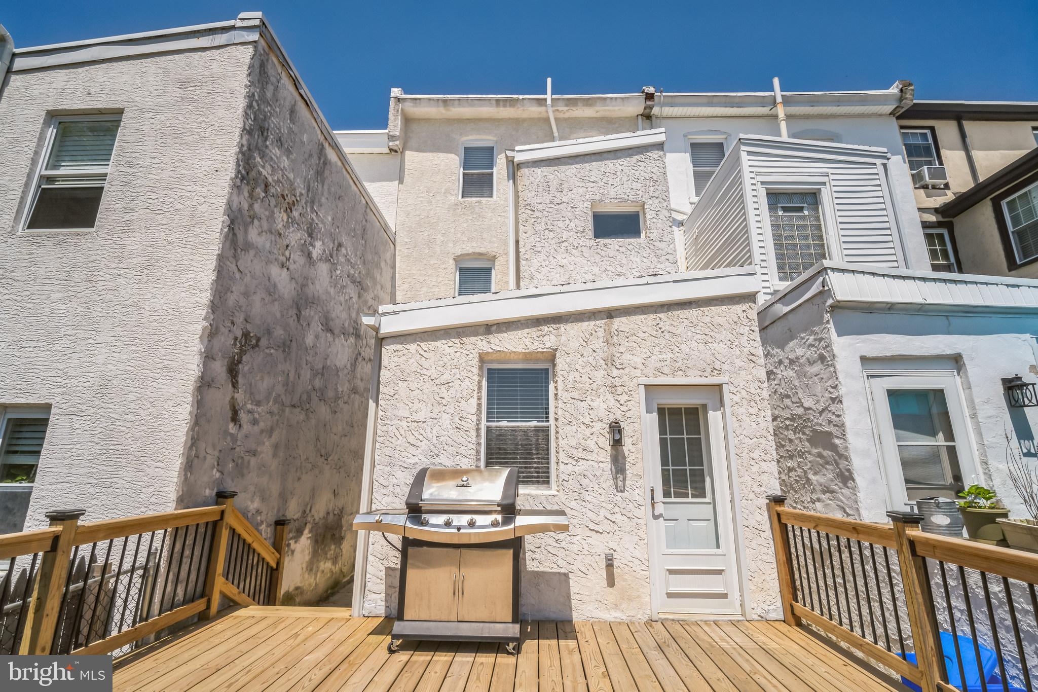 126 Ripka Street Philadelphia, PA 19127 - Photo 12 of 30 a view of a house with wooden deck