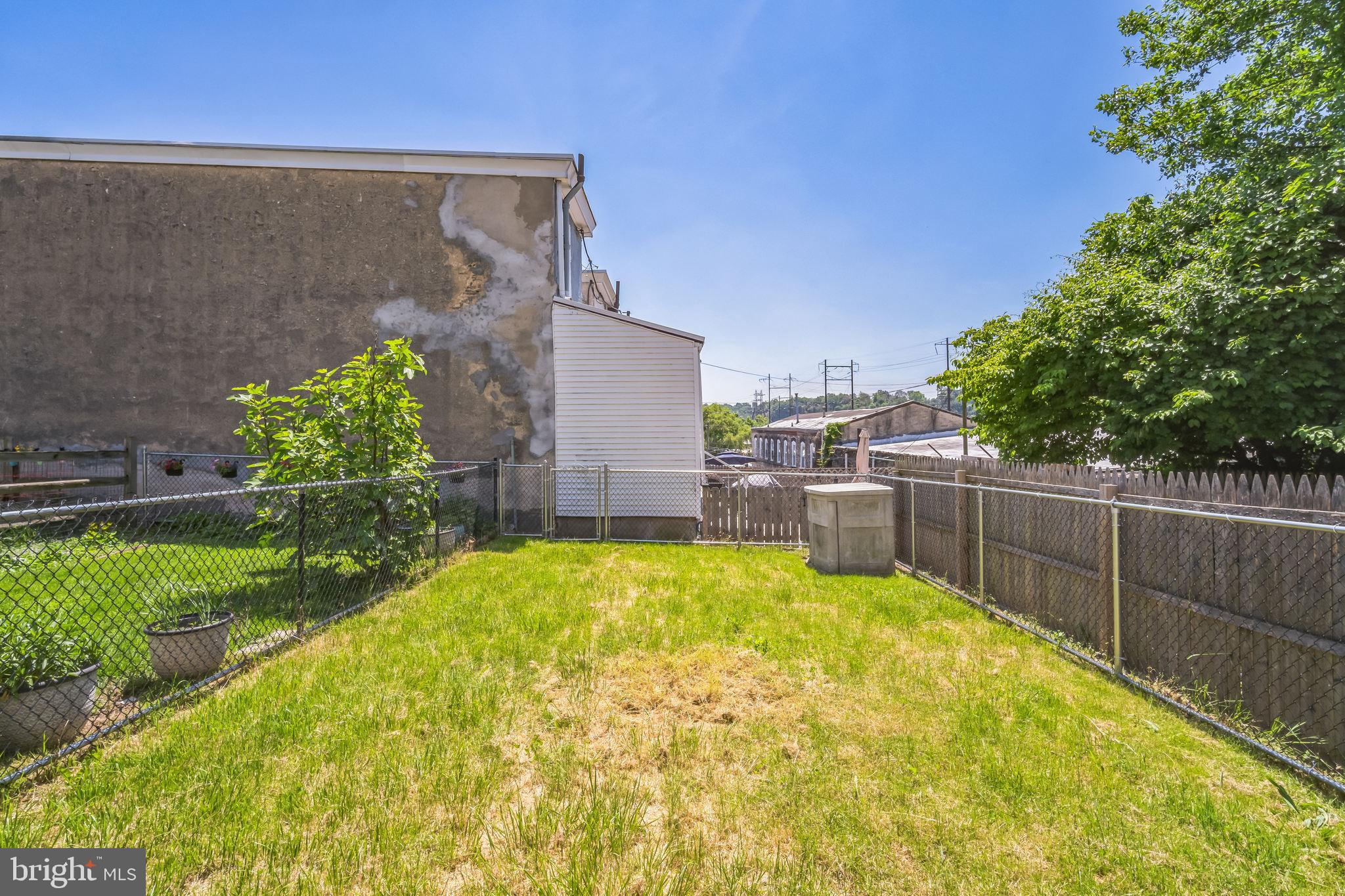 126 Ripka Street Philadelphia, PA 19127 - Photo 13 of 30 a swimming pool with outdoor seating and yard