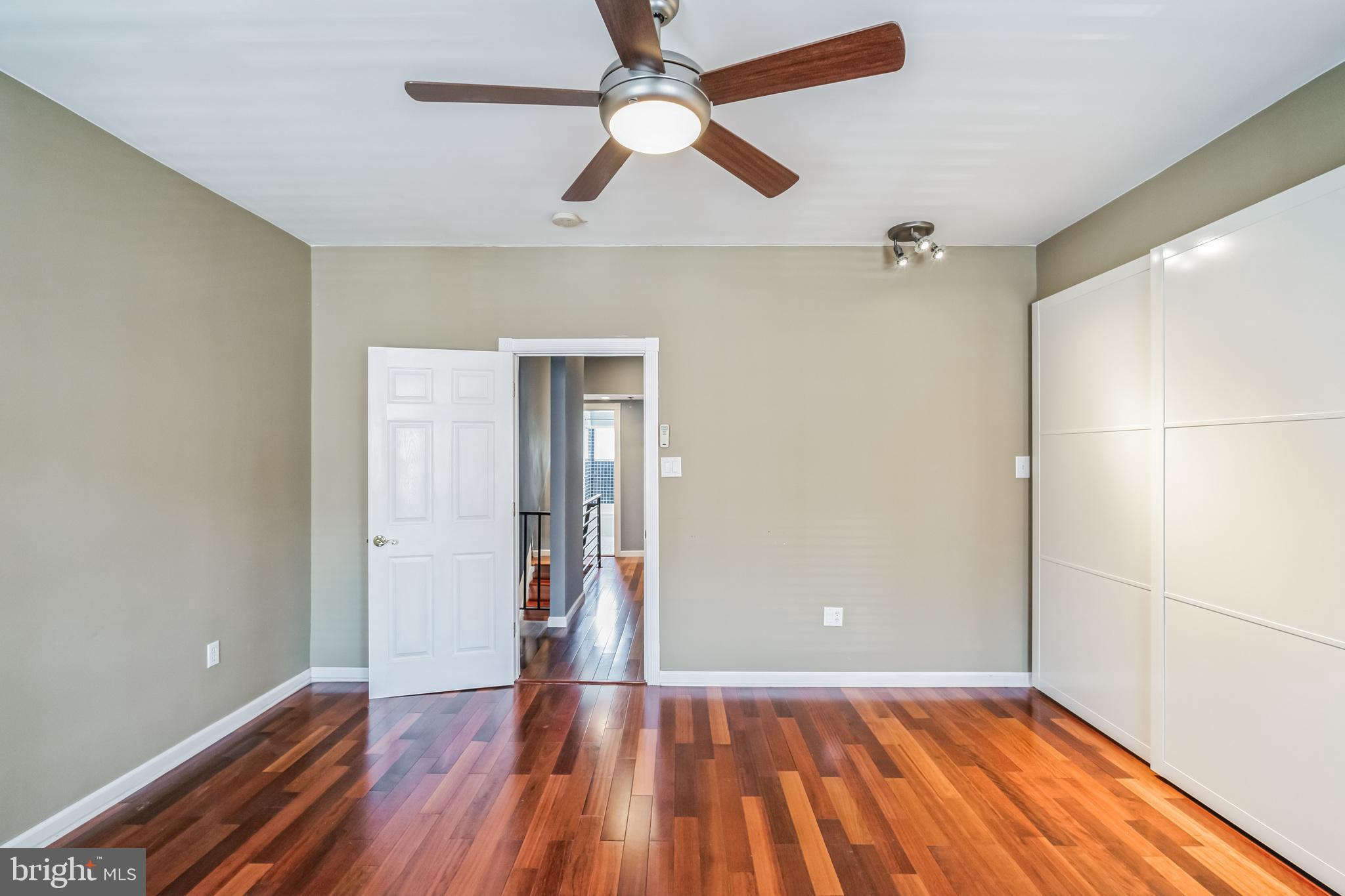 126 Ripka Street Philadelphia, PA 19127 - Photo 19 of 30 wooden floor in an empty room with a window