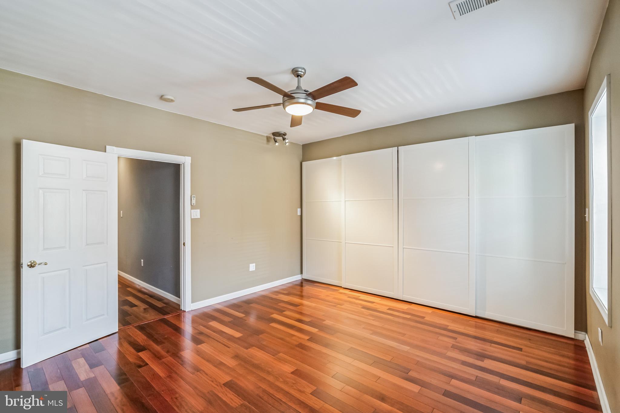 126 Ripka Street Philadelphia, PA 19127 - Photo 21 of 30 a view of empty room with wooden floor and fan