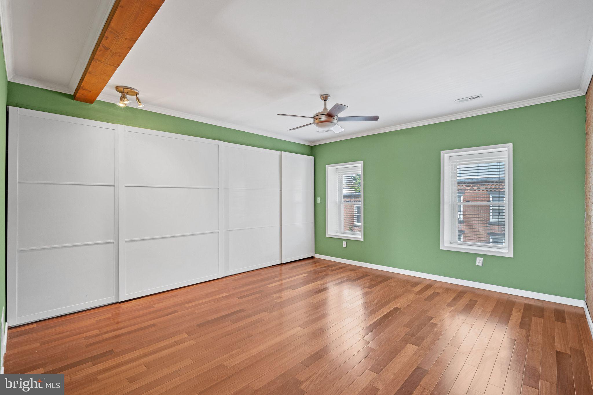 126 Ripka Street Philadelphia, PA 19127 - Photo 24 of 30 a view of an empty room with a window and wooden floor