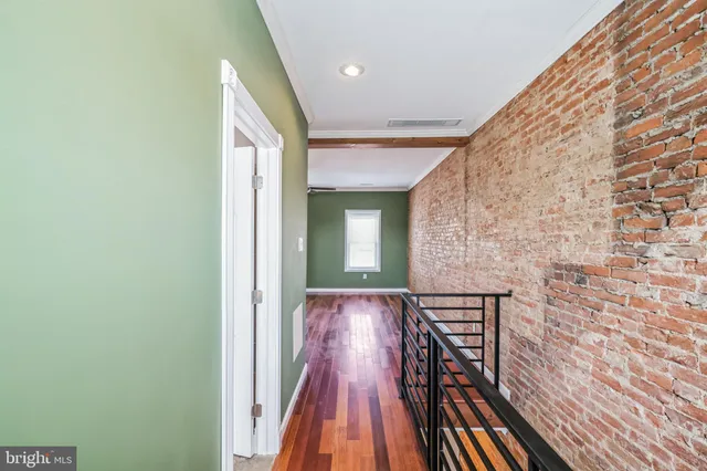a view of wooden floor in a bathroom