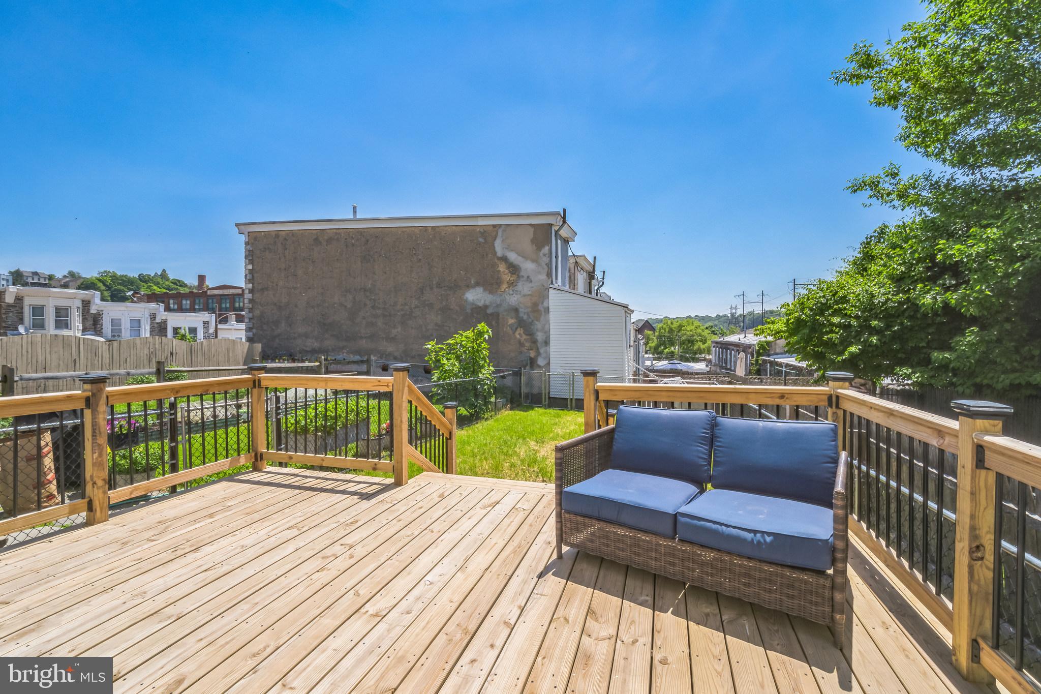 126 Ripka Street Philadelphia, PA 19127 - Photo 10 of 30 a view of roof deck with a couple of couches and city view