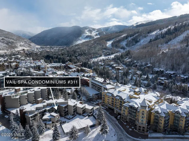 a view of staircase with a rug