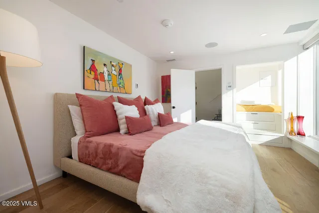 a bathroom with a tub and shower