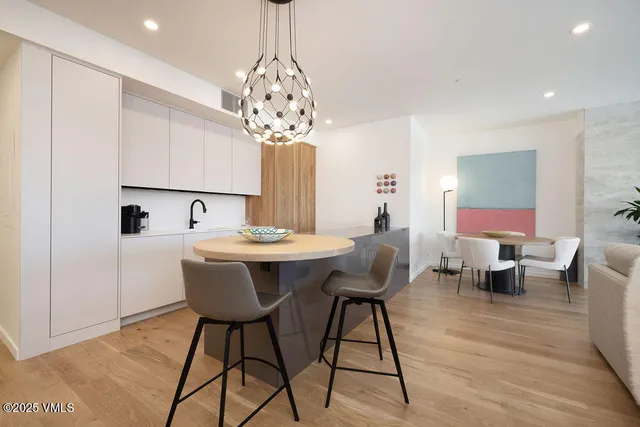 a view of a kitchen from a dining room