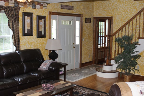 110 School House Road Phillipston, MA 01331 - Photo 11 of 22 a living room with furniture and a potted plant