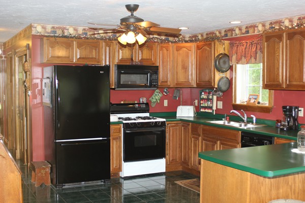 110 School House Road Phillipston, MA 01331 - Photo 16 of 22 a kitchen with stainless steel appliances granite countertop a refrigerator a stove and a sink