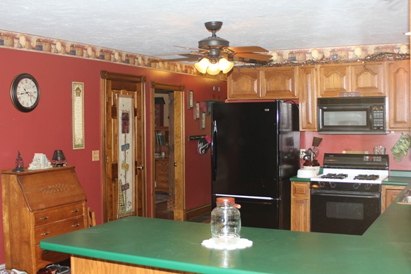 110 School House Road Phillipston, MA 01331 - Photo 17 of 22 a kitchen with a refrigerator and a stove top oven