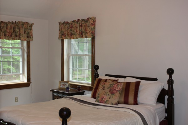 110 School House Road Phillipston, MA 01331 - Photo 6 of 22 a bedroom with a bed and a window