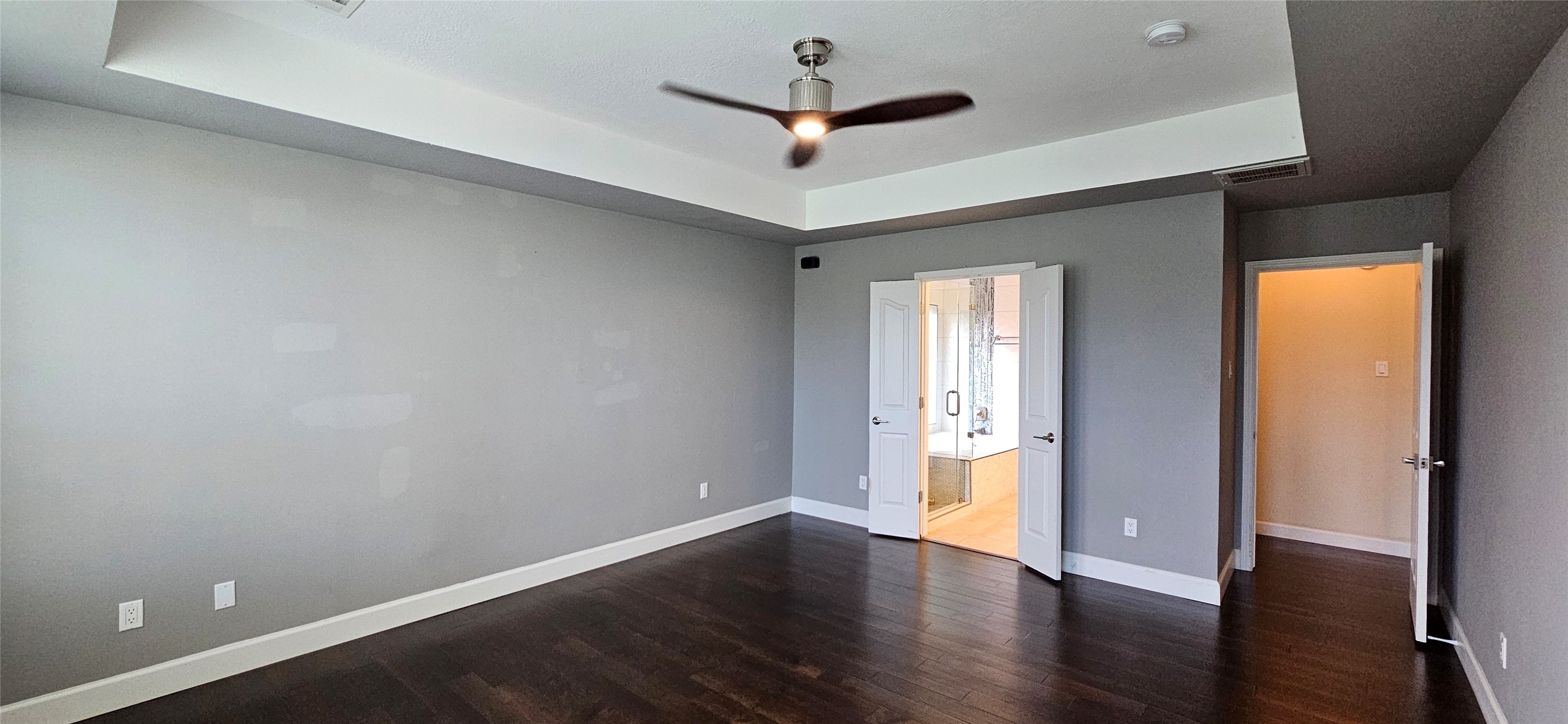 13035 Bainbridge Trail Houston, TX 77065 - Photo 12 of 31 a view of an empty room with a window and wooden floor