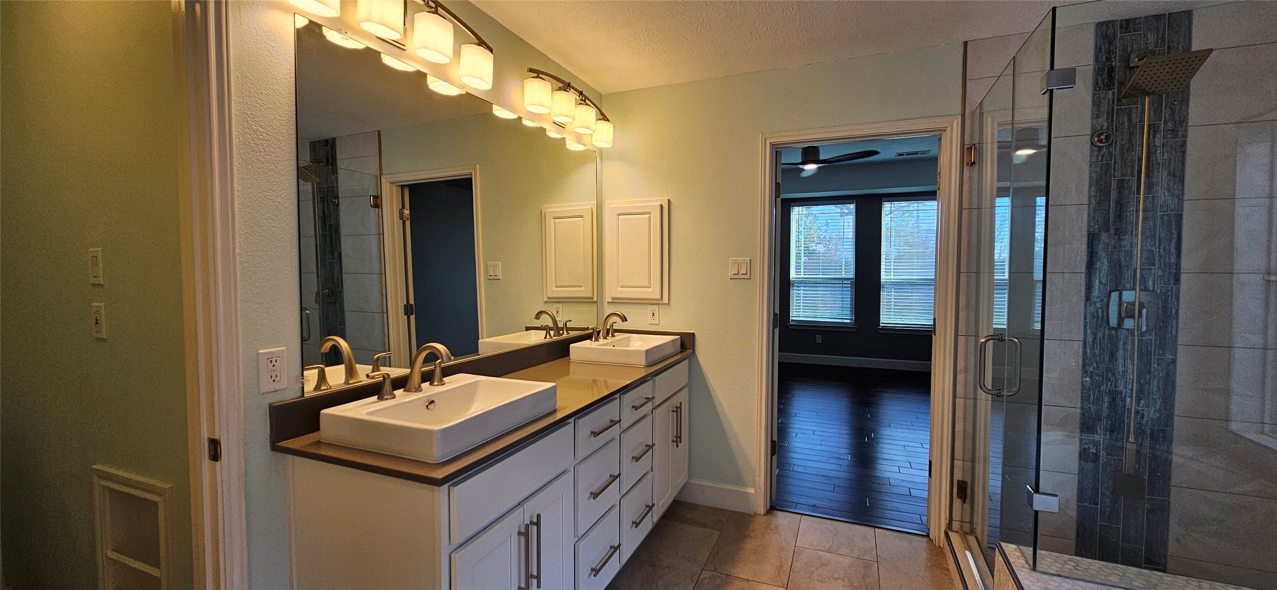13035 Bainbridge Trail Houston, TX 77065 - Photo 16 of 31 a bathroom with a sink and a mirror