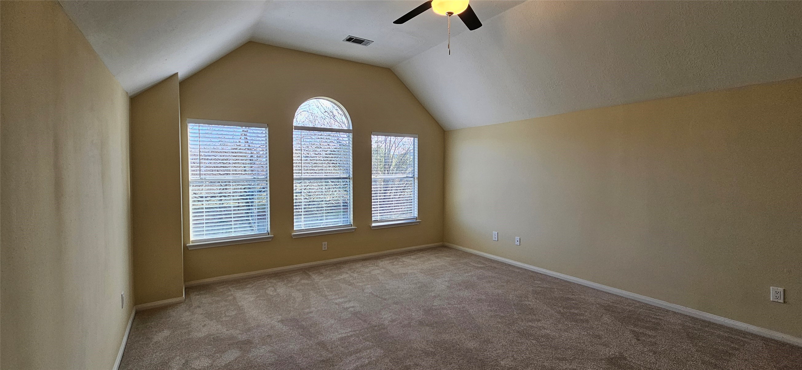 13035 Bainbridge Trail Houston, TX 77065 - Photo 17 of 31 an empty room with windows and entertaining space