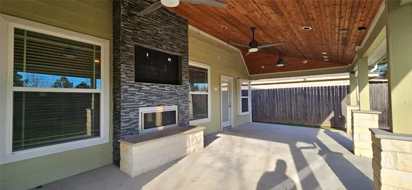 a view of a porch with a tv