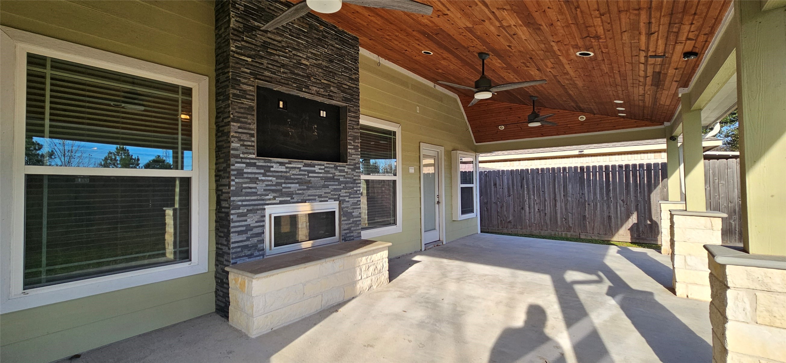 13035 Bainbridge Trail Houston, TX 77065 - Photo 26 of 31 Gorgeous covered patio with two fans and gas fireplace
