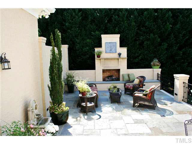 2509 Sharon View Lane Raleigh, NC 27614 - Photo 23 of 25 Wonderful raised patio with Fireplace ~ Peaceful with views of the Lake!